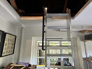 New loft hatch and folding loft ladder installed on a landing